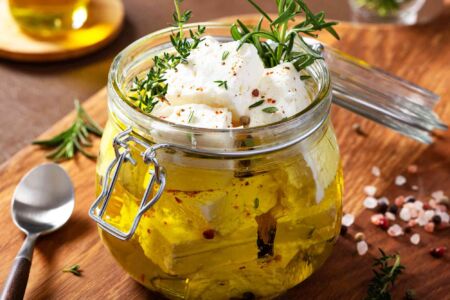 Feta Cheese In Olive Oil With Fresh Herbs
